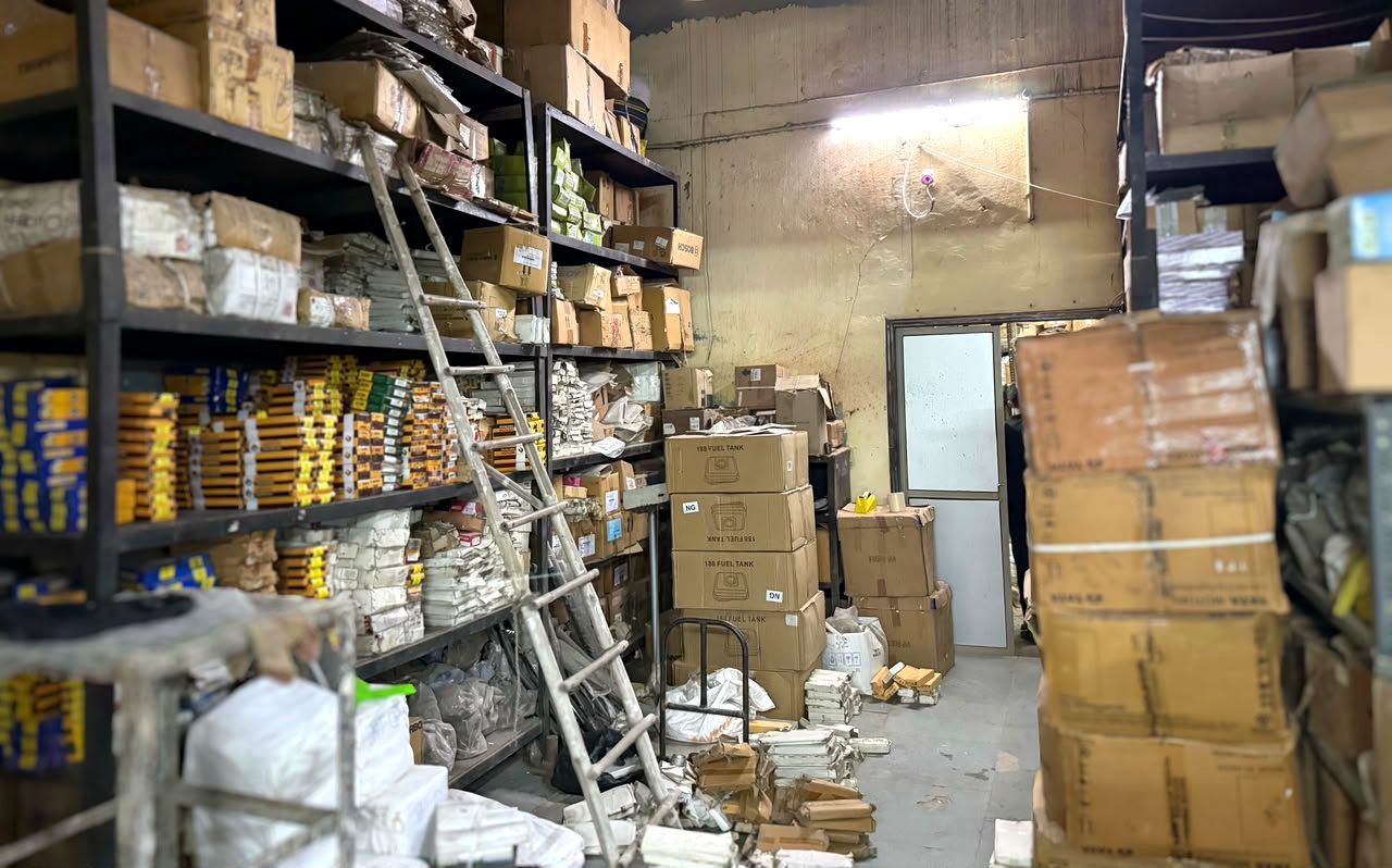 An aisle of the BMC Power spares stores in Delhi, racked floor to ceiling