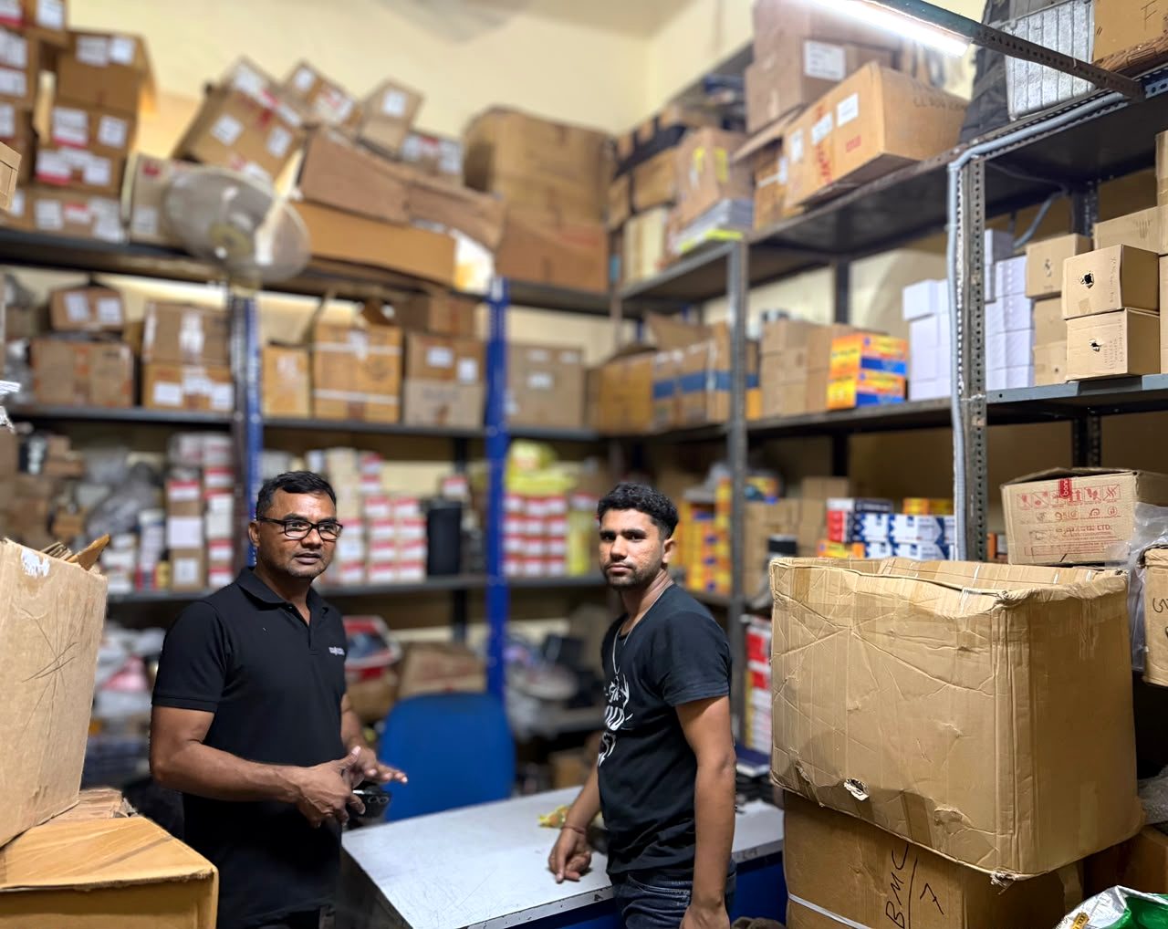 Staff at the packing bench in the BMC Power stores in Delhi
